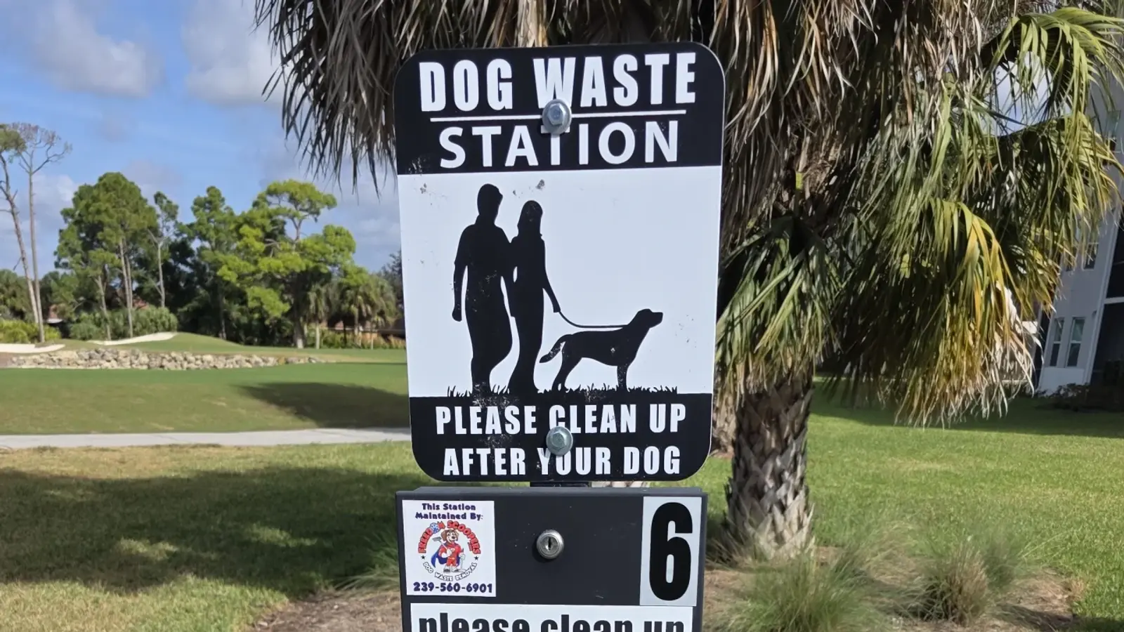 Installed Freedom Scoopers dog waste station at a Lee County commercial property